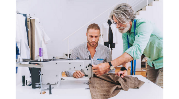 sample-machinist-and-pattern-cutter-cutting-the-clothpiece