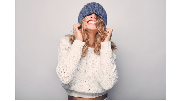 White-women-wearing-binny-and-white-sweater