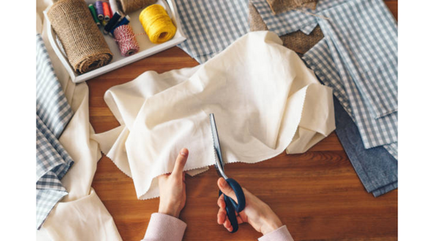 Perosn-cutting-clothes