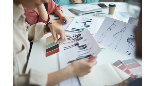 Designer-drawing-early-sketches