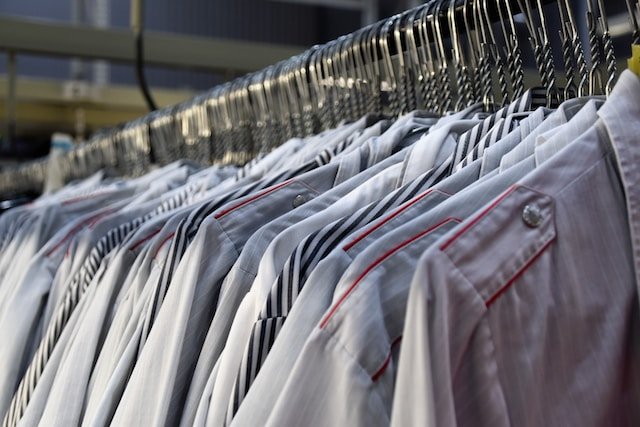 grey colored Shirts hanging