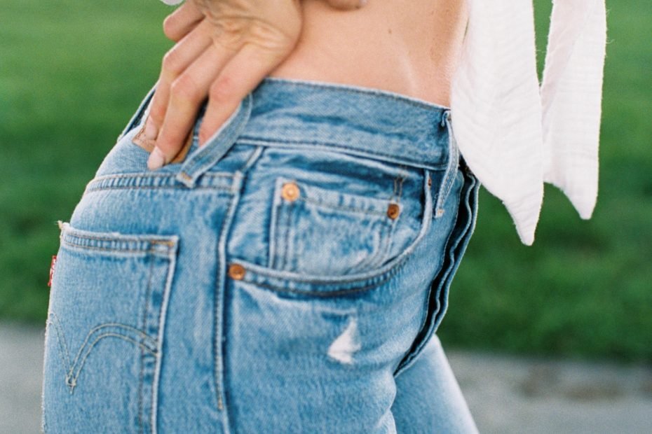 a-girl-in-skinny-blue-jeans-and-white-top